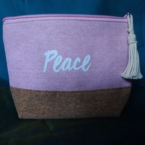 2 for $11. Cosmetic bag. PEACE. NEVER USED